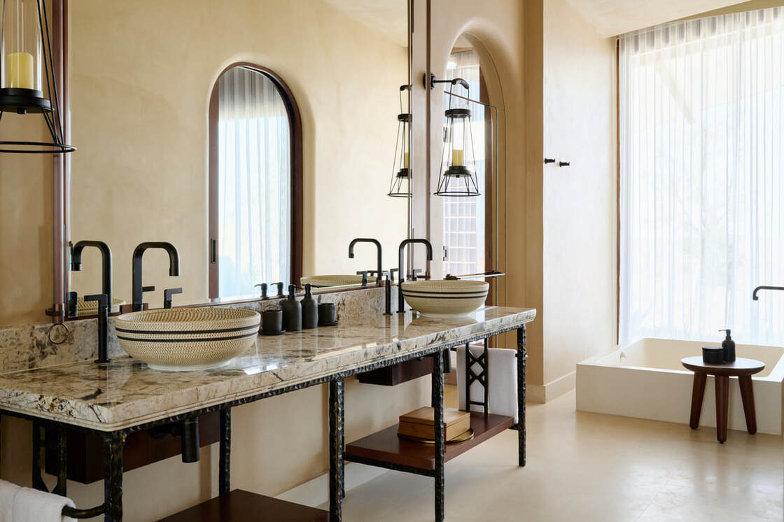 A bathroom finished in hand-applied microcement with no grout lines